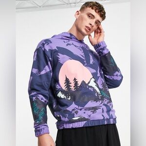 ASOS DESIGN oversized hoodie in purple with all over mountain print